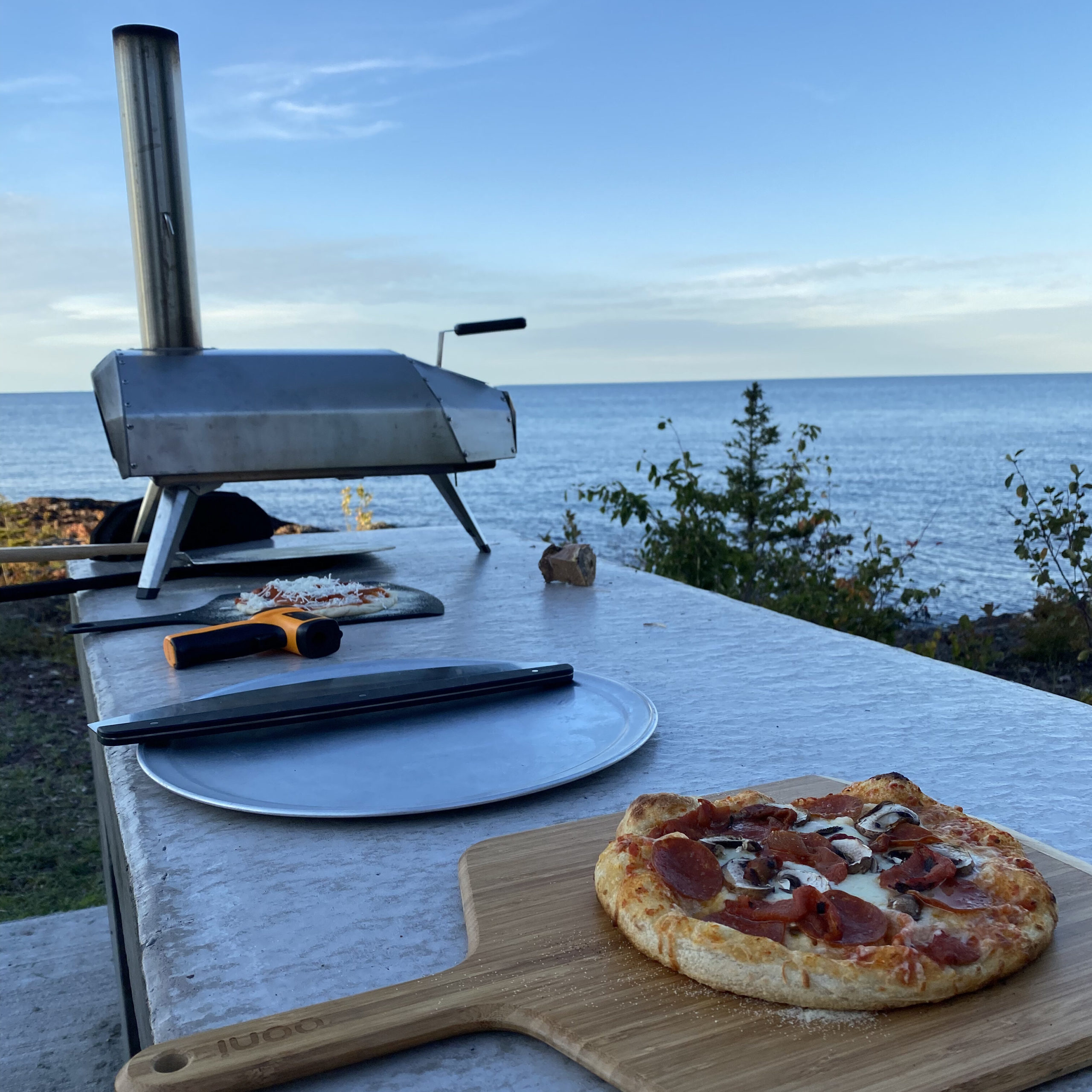 The Ooni Karu wood-fired pizza oven cooks delicious pizza for guests at Fresh Coast Cabins on Friday nights. 